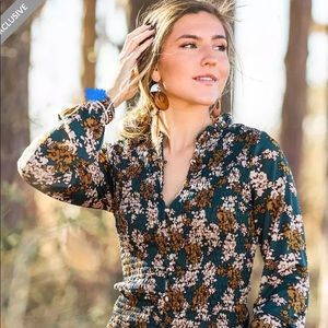 FLORAL SMOCKED BLOUSE from Buckle!
